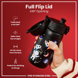 A black water bottle with a space theme design is being held. Its full flip lid offers a 240° opening. The bottle is shown against a red background.