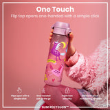 A pink unicorn-decorated water bottle is being held; its flip top opens one-handed. The bottle features a triple lock security mechanism and is advertised as 100% leakproof. 