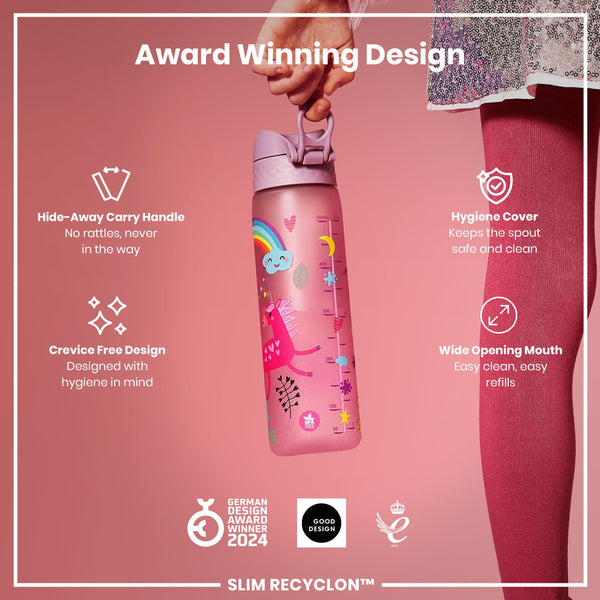 A pink children's water bottle, with a unicorn design, is being held; it features a hide-away handle, wide mouth, and hygiene cover. Award Winning Design. German Design Award Winner 2024. Good Design. Slim Recyclon™.