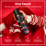 A black, space-themed water bottle is held; its flip top opens one-handed. The bottle is situated on a red background. 